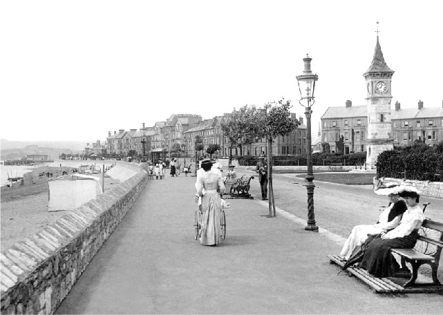 people walking along the sea front at Exmouth in 1928