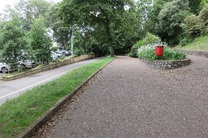 A path sloping down with a hairpin bend.