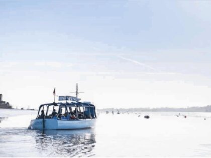 RSPB boat out on the water with passengers